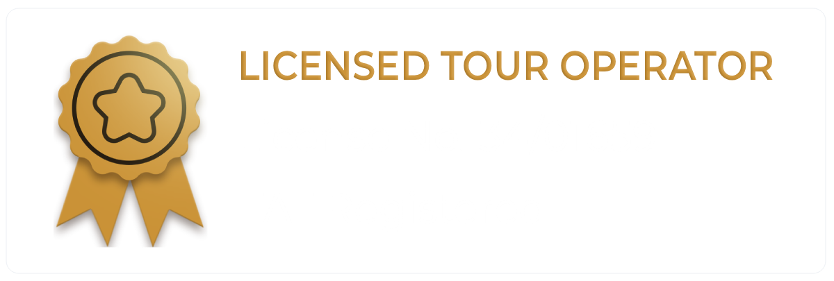 Gold badge with star and text: 'Licensed Tour Operator'.